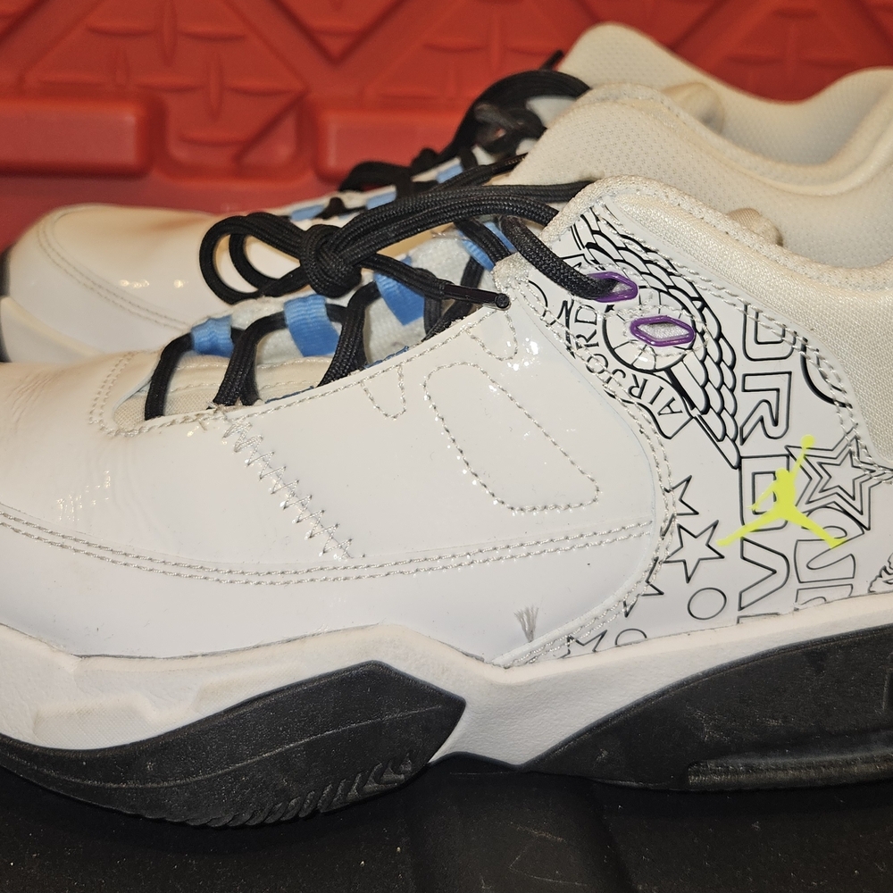 Nike Kids White and Black Sneakers with Blue and Yellow Accents